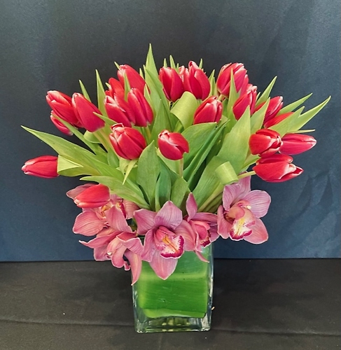 Red Tulips With Orchids